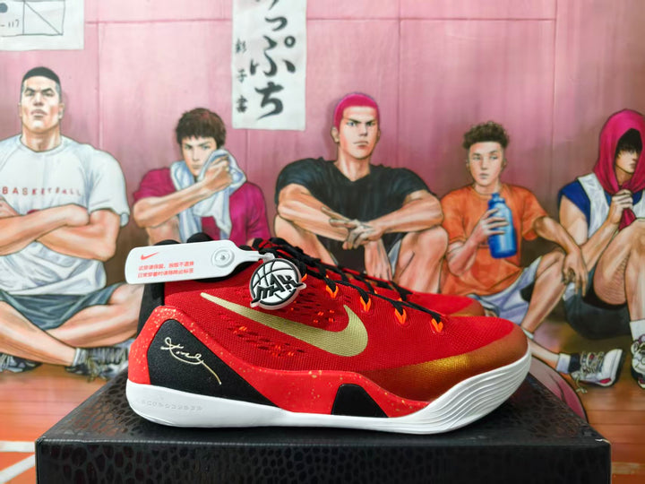 Red and gold Nike Kobe low-top basketball shoe shown from the side.