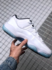 Side profile of the sneaker showing the low-cut shape, white upper, and translucent outsole.