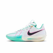 Side view of a white Nike GT Cut 3 sneaker with pink and mint green accents and a translucent aqua outsole.