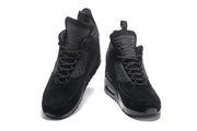 Pair of black high-top Air Max 90 sneakerboots viewed from the front