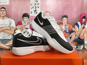 Pair of white and black Nike basketball shoes shown from the side and at an angle.