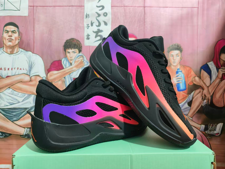 Pair of black Jordan sneakers showing purple-to-pink side panels and orange accents