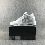 Side view of the sneaker on a black Jordan shoebox with a visible size label showing US 10.5, UK 9.5, EU 44.5, and CM 28.5.