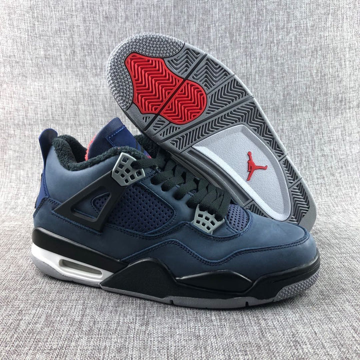 Pair of dark navy Jordan Air Jordan 4 sneakers shown from the side with one outsole facing upward.