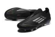 Pair of black adidas F50 laceless soccer cleats shown from front and side.