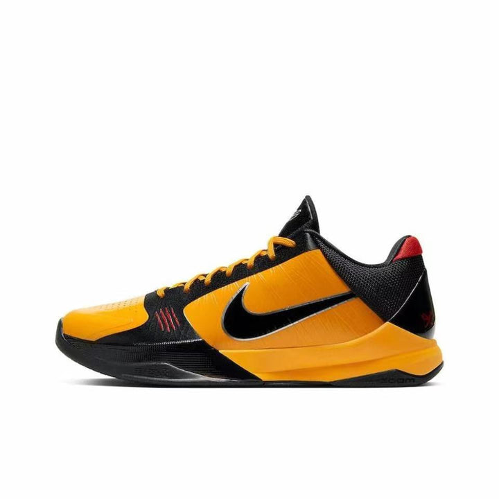 Nike Kobe 5 sneaker in orange and black with yellow laces and a black outsole.