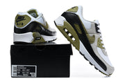 Nike Air Max 90 QS sneakers in white, black and olive shown with the shoebox; the box label shows a sample size.