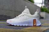 Nike White and Orange Low-Top Sneakers