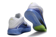 White and blue Nike GT Hustle 3 shoes shown from heel and outsole angles, with lime accents.