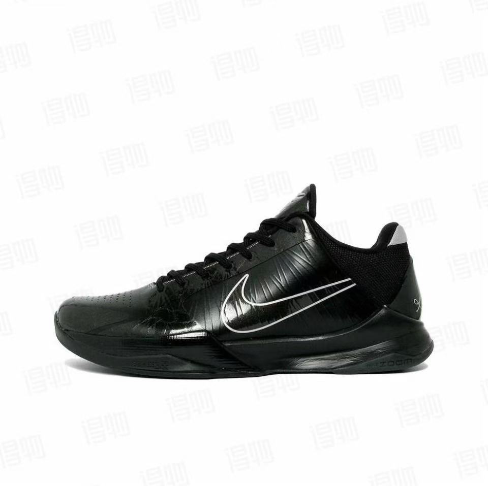 Black low-top Kobe 5 basketball shoe with a white outlined side swoosh and black outsole.