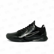 Black low-top Kobe 5 basketball shoe with a white outlined side swoosh and black outsole.