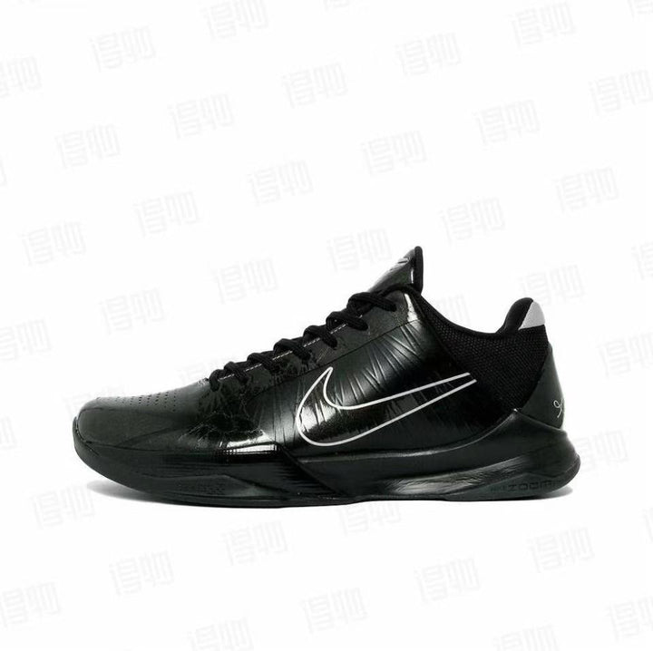 Black low-top Kobe 5 basketball shoe with a white outlined side swoosh and black outsole.