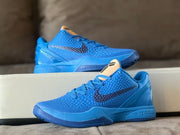 Pair of blue Kobe 6 shoes in side and angled views.