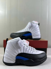 Close side profile highlighting the white quilted upper, black textured forefoot, and blue side accent.