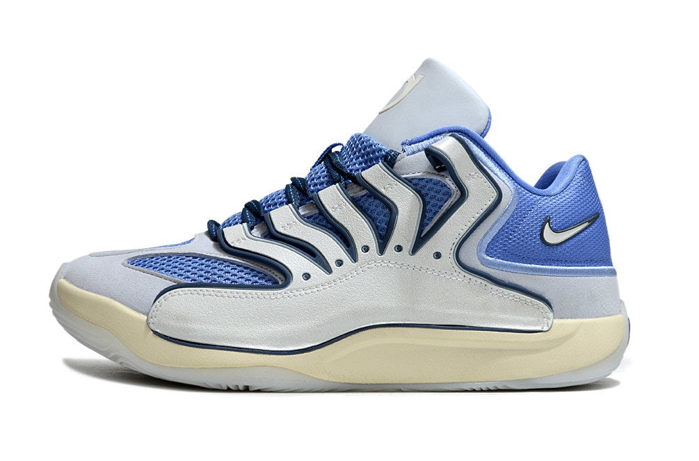 Side view of blue and white Nike KD 18 basketball sneakers.