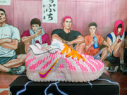 Side view showing the purple-and-orange Swoosh, pink detailing, and translucent sole.