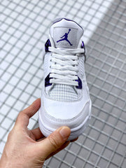 Front view showing the white toe box, laces, mesh tongue panel and purple Jordan logo.