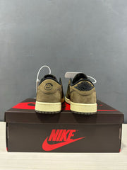 Rear view of the sneaker pair showing contrasting heel graphics and cream midsoles.