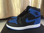 Close side view showing the blue Swoosh-style side panel, black upper and blue ankle section.