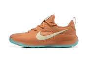Side profile showing the cream Swoosh and textured rust-brown upper