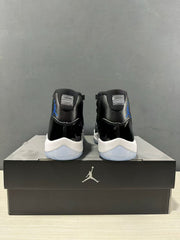 Rear view of the pair showing blue Jordan branding, black uppers and translucent blue outsoles.