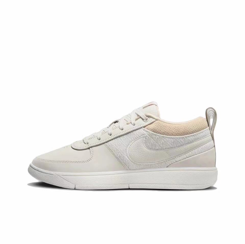 White low-top sneaker with tonal side swoosh, white outsole, and rear pull tab.