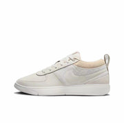 White low-top sneaker with tonal side swoosh, white outsole, and rear pull tab.