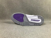 Outsole view showing the gray tread, purple circular traction section, and Jordan branding.