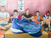 Side profile of the blue ASICS basketball shoe with contrasting accents.