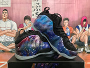 Angled display of the pair, highlighting the galaxy-patterned exterior, black upper and translucent soles.