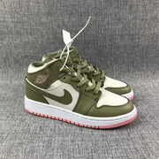 Front three-quarter view of the pair showing olive toe overlays, white toe boxes, and matching laces.