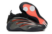 Black and red Adidas Harden Vol. 9 sneaker showing the side profile and outsole traction.