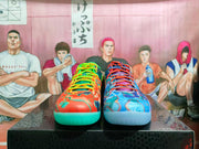 Front view of the two differently colored basketball shoes