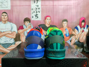 Rear view of the blue-and-orange and green-and-orange basketball shoes