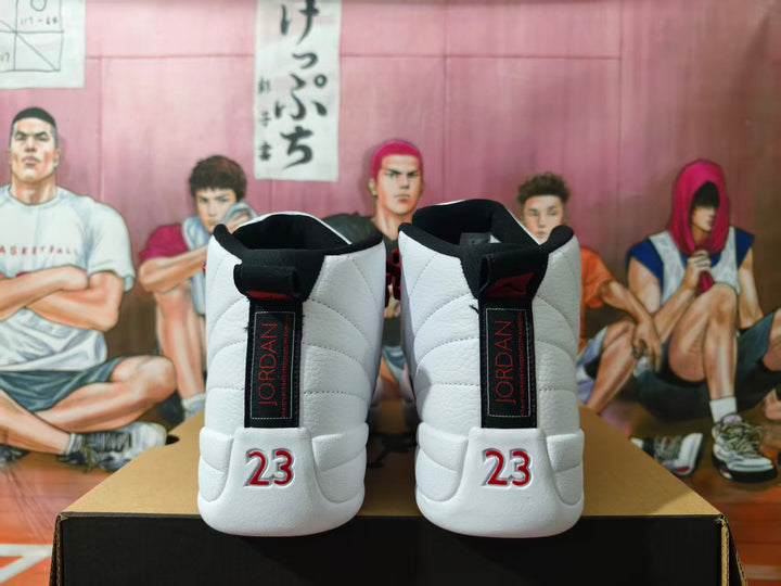 Rear view of white and black high-top sneakers with red Jordan branding and number 23 details.