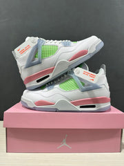 Stacked product display showing the sneakers' side panels, lime green mesh, pink midsoles, and light blue structural details.