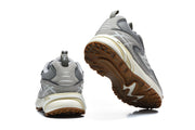 Rear and outsole views of grey Louis Vuitton sneakers