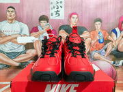 Front view showing the red uppers, black laces, padded tongues, and Air branding.