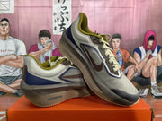 Pair of Nike running shoes shown from the side, highlighting the mixed-color design and ZoomX lettering.