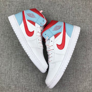 Pair of white, ice blue, and red mid-top Jordan sneakers shown from angled side views.