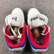 Top view of the pair showing the padded tongues and red-and-blue interior accents.