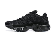Side profile of a black Nike Air Max Plus sneaker
