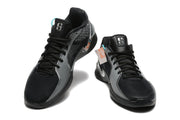 Pair of black and grey Nike Sabrina 2 shoes shown from the front and side.
