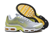 Nike Air Max Plus VII sneakers shown with the yellow, white and black outsole.
