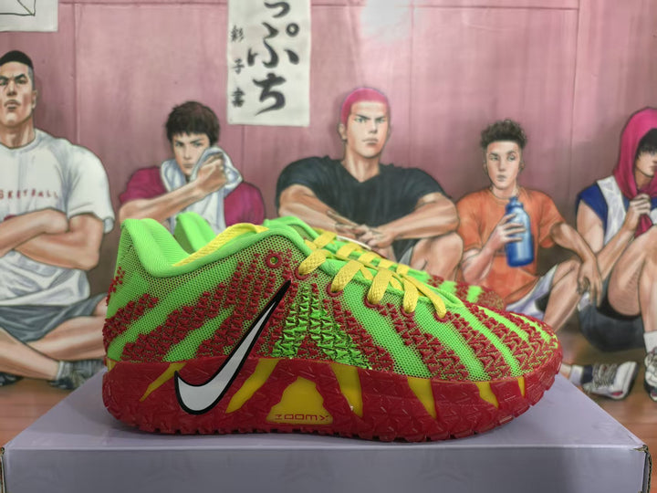 Side view of green and red Nike sneakers with yellow laces, patterned uppers, red outsoles, and visible ZOOM marking.