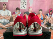 Rear view showing the red padded collars and reflective silver heel panels.