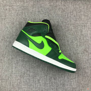 Single Jordan 1 Mid sneaker displayed at an angle with dark green, fluorescent green, black, and white details.