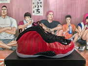 Side profile showing the glossy red high-top silhouette, black lace panel, visible Nike swoosh, and contrasting outsole.