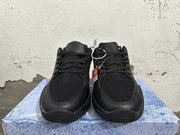 Front view showing the black mesh toe panels and laces