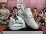 White Nike basketball sneakers displayed at an angle, showing mesh-textured side panels.